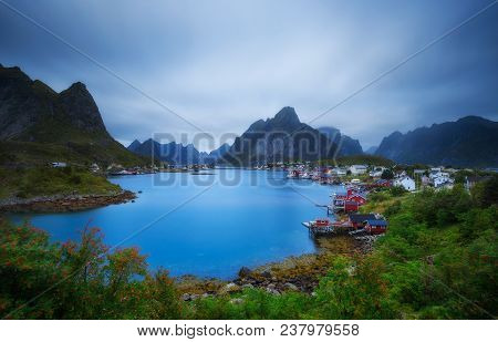 Mount Olstind And Reine Fishing Village On Lofoten Islands In Norway. Long Exposure.