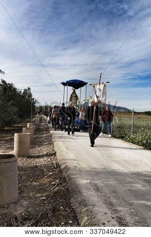 Orihuela, Spain- November 24, 2019: Parishioners Carrying The Beautiful And Old Virgin Of The Miracl