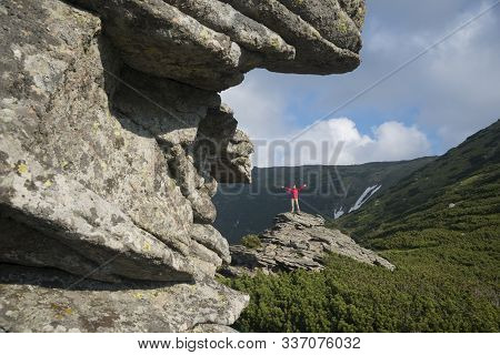 Woman Among The Majestic Mountains