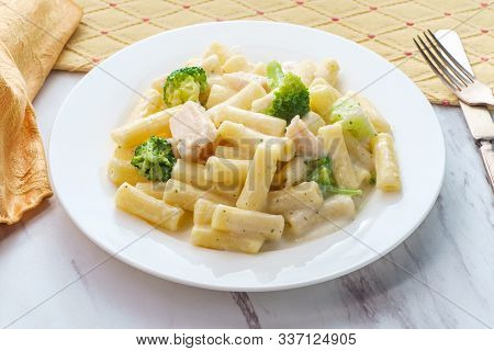 Italian Rigatoni Chicken Alfredo Pasta Dish With Broccoli