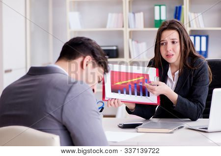 Business meeting between businessman and businesswoman