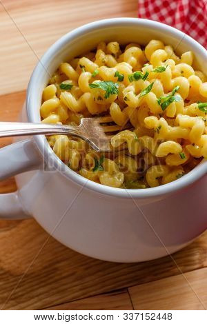 Delicious Macaroni And Cheddar Cheese Cellentani Pasta In A Bowl