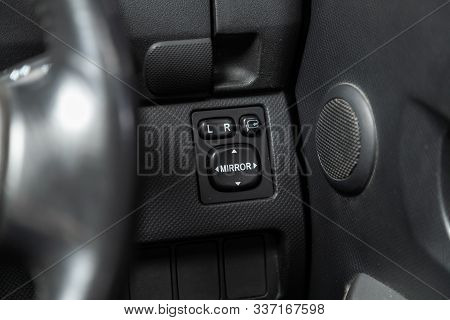 Novosibirsk, Russia - November 06, 2019:  Toyota Ractis,close-up On The Side Mirror Control Buttons.