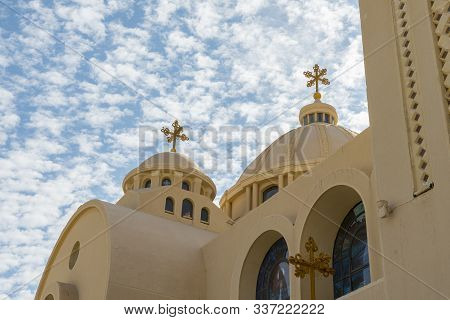 Coptic Orthodox Church In Sharm El Sheikh, Egypt.against The Backdrop Of A Beautiful Sky With Clouds