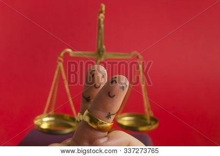 Purposal Devorce Creative Concept. Painted Happy Fingers Smiley In Love Against Red Background With 