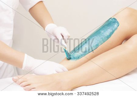 Azulene Depilation. Wax Hair Removal, Shugaring. Concept Of Smooth Skin Without Hair. Azulene Of Gre