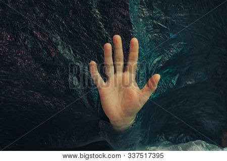 Beautiful Abstract Plastic Cellophane  Bag Background. Human Hand Shows Palm Help Stop.  No Plastic 