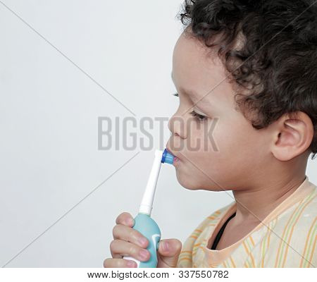 Little Boy Brushing His Teeth With An Electric Tooth Brush Stock Image With White Background Stock P