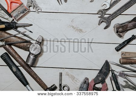 Construction Hammers Screwdriver Repair Tool Pliers On The Board