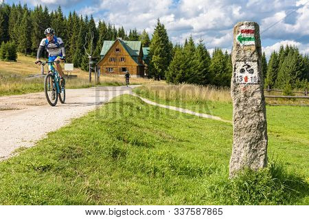 Jakuszyce, Poland - September 11, 2019: Mountain Biker On The Bike Trail In Jizera Mountains In Pola