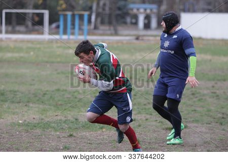Odessa, Ukraine November 24, 2019: Local Rugby Clubs Engaged In Fierce Fight On Green Unequipped Fie