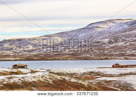 First Snow In October At The Lake Orkel Located In The Oppdal Area, Norway