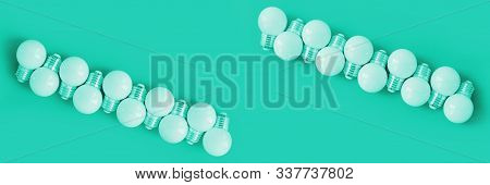 Banner With Popular Color 2020 Blue. Lamps, Led Lamps And Fluorescent Lamps On Blue Background. Larg
