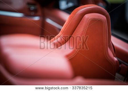 Close Up Shot Of The Leather Headrest Of A Seat In A Modern Luxury Car.