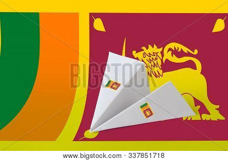 Sri Lanka Flag Depicted On Paper Origami Airplane. Handmade Arts Concept