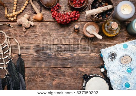 Witch Doctor Or Shaman Table Flat Lay Background. Magic Book On The Witch Desk.