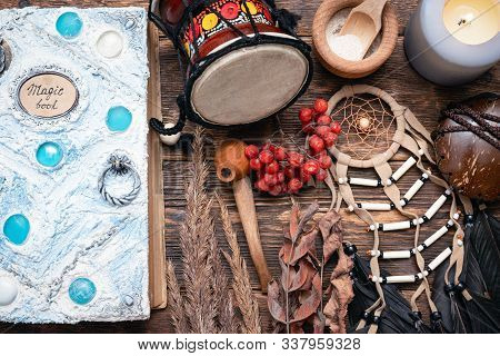 Witch Doctor Or Shaman Table Flat Lay Background. Magic Book On The Witch Desk.