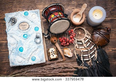 Witch Doctor Or Shaman Table Flat Lay Background. Magic Book On The Witch Desk.