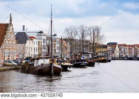 Cityscape Of Leiden, The Netherlands. View Of New Rhine River And Dutch Houses.
