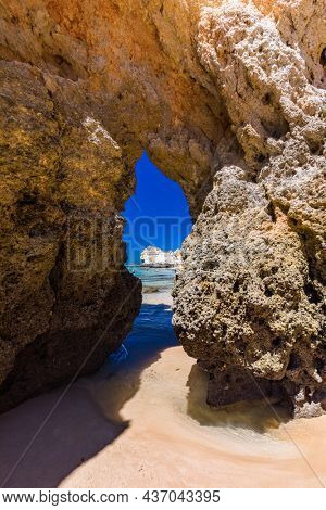 Aerial and panoramic view of Praia dos Tres Irmaos beach, Alvor, Algarve, Portugal