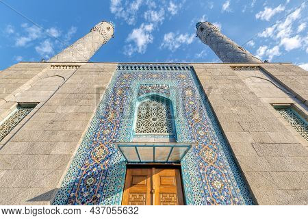 Colorful Blue And Turquoise Traditional Mosaic Decorating The Mosque. Oriental Ornament On The Facad