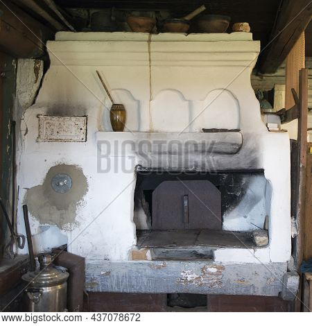 Russian Stove. Interior Of Old Russian Home With Traditional Oven