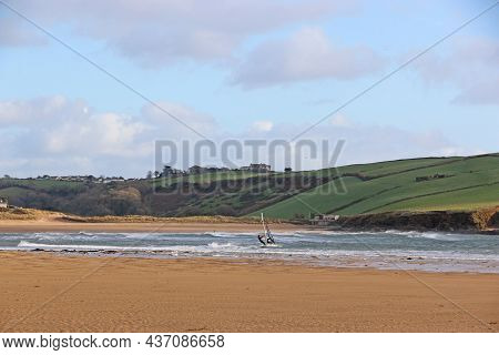 Windsurfing At Bigbury Beach, Devon, At Low Tide
