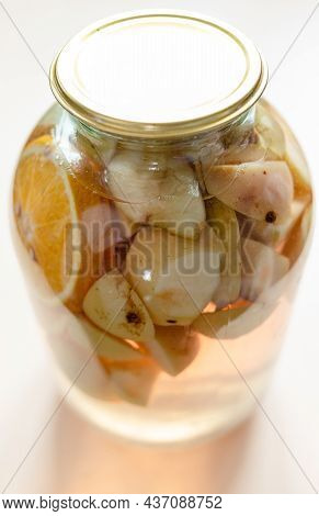 3-liter Glass Jar With Homemade Compote (stewed Fruit) Made From Sliced Fresh Apples And Oranges Clo