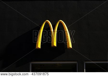 Chemnitz, Germany - 16-10-2021: Mcdonalds Restauraunt Sign On The Black Background. Mcdonalds Sell F