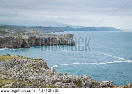 Dramatic Cliffs At The Cantabrian Coast In Famous Bufones De Pria On A Misty Autumn Day. Moody Coast