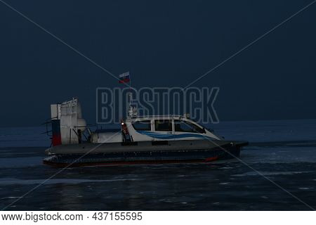 The Hovercraft Stands On The Frozen Lake Baikal. Tourism In Russia