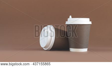 Banner Of Two Paper Corrugated Coffee Cups With Caps On Brown Background With Copy Space