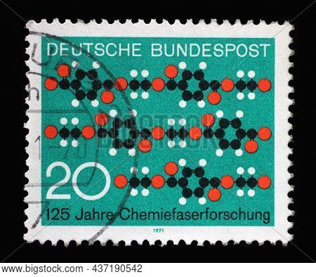 ZAGREB, CROATIA - JUNE 27, 2014: Stamp printed in Germany showing a picture with chain molecules, 125 years of chemical fiber research, circa 1971
