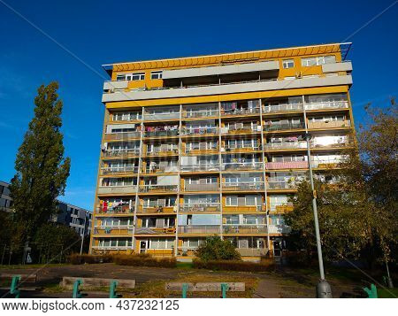 Prague, Czech Republic - October 24, 2021: Tall Yellow Block Of Flats With Balcony On Every Flat And