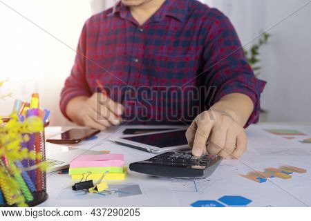 Business Financing Accounting Banking Concept, Businessman Doing Finances And Calculate About Cost T