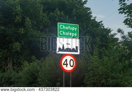 Street Entrance Sign Of Chalupy City In Polish And Kashubian Languages. Sign Chalupy Town In Polish 