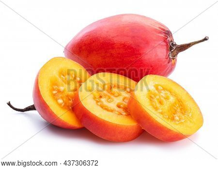 Ripe tamarillo fruits with tamarillo slices  isolated on a white background.