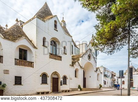 Alberobello,italy - September 3,2021 - Street With Church Of Saint Anthony In Alberobello. Aberobell
