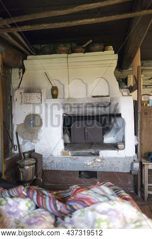 Russian Stove. Interior Of Old Russian Home With Traditional Oven