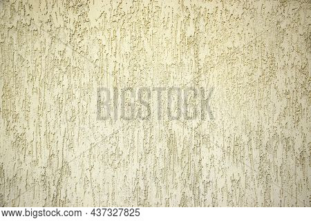 Texture Of Ivory Ribby Stucco On Cement Wall.