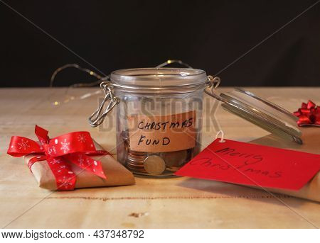 Christmas Savings Fund In Glass Jar To Buy Gifts
