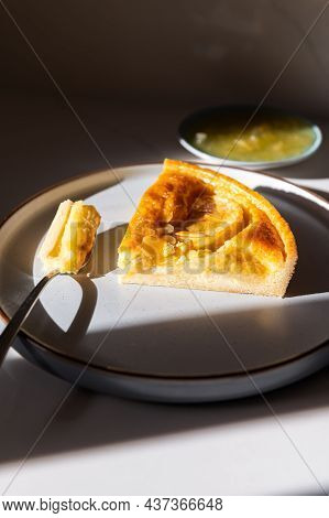 Shortcrust Pastry Case Filled With Bramley Apple Compote And Ground Almond Sponge, Topped With Braml
