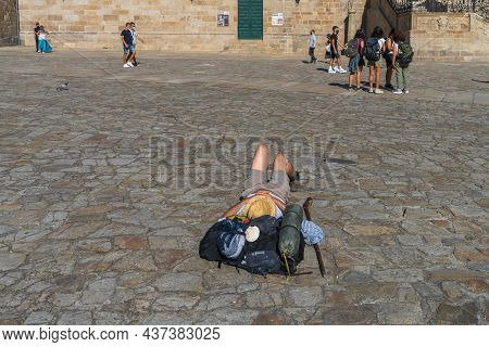 A Coruna, Spain, August 15, 2021. Pilgrims In The Plaza Del Obradoiro Before The Cathedral Of Santia
