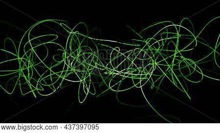 Tangled Line Moves On Black Background. Motion. Twisting Tangled Colored Line On Black Background. M