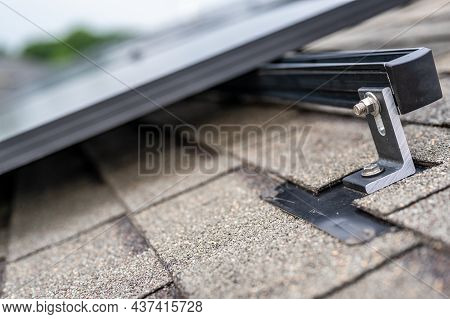 Rail, Bracket, And Anchor To A Solar Panel Installed On A Asphalt Shingle Roof