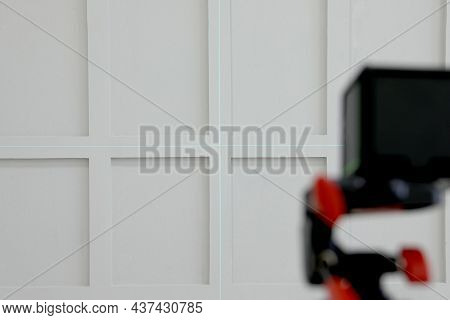 Cross Lines Of Laser Level On Light Wall