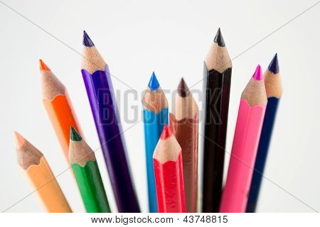 Colour pencils isolated on white background close up