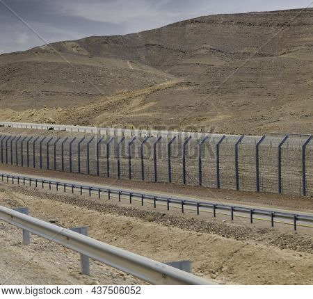 Fence On The Border In The Negev Desert Between Egypth And Israel