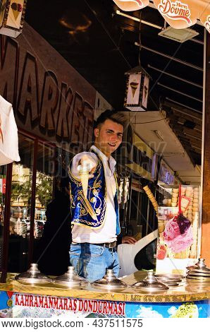 Avanos, Turkey-october 8, 2021:young Dondurma Ice-cream Seller Dressed In Traditional Turkish Costum
