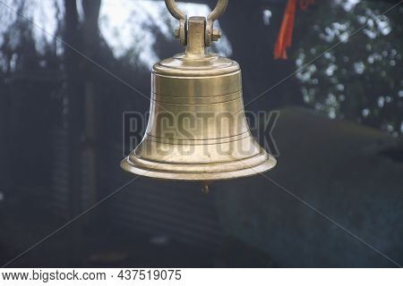 Stock Photo Of Two Ancient Copper Or Bronze Bell Hanging On A Iron Frame At Hindu Temple On Blur Fog
